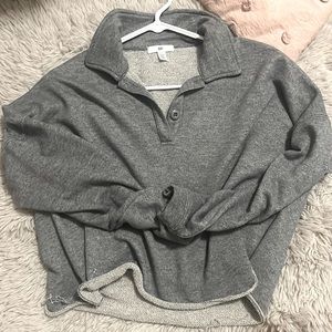 This is the cutest gray sweater. Perfect for the coming spring weather.